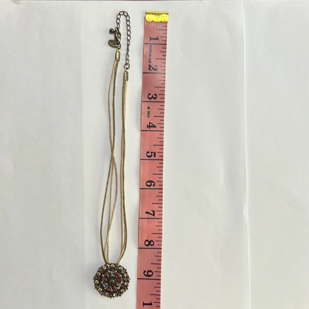 Round Pendant Multi-Color Brilliant Stones Gold Cord Strand